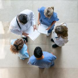 Health care professionals in a circle 